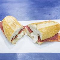 3. Crocque Monsieur Sandwich · Turkey-ham and Gruyere cheese.