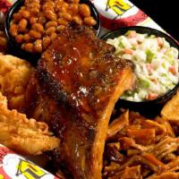 Shack Sampler Plate · You get 1/4 rack of our delicious baby back ribs, 2 tenders and your choice of 1/4 lb. of pu...
