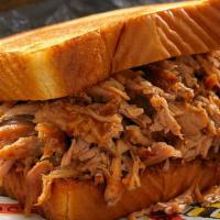 Big Dad Sandwich · Our signature slow-smoked and hand chopped BBQ pork on Texas toast.