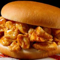 Chopped BBQ Chicken Sandwich · All white meat, chopped and lightly sauced BBQ chicken on a toasted bun.