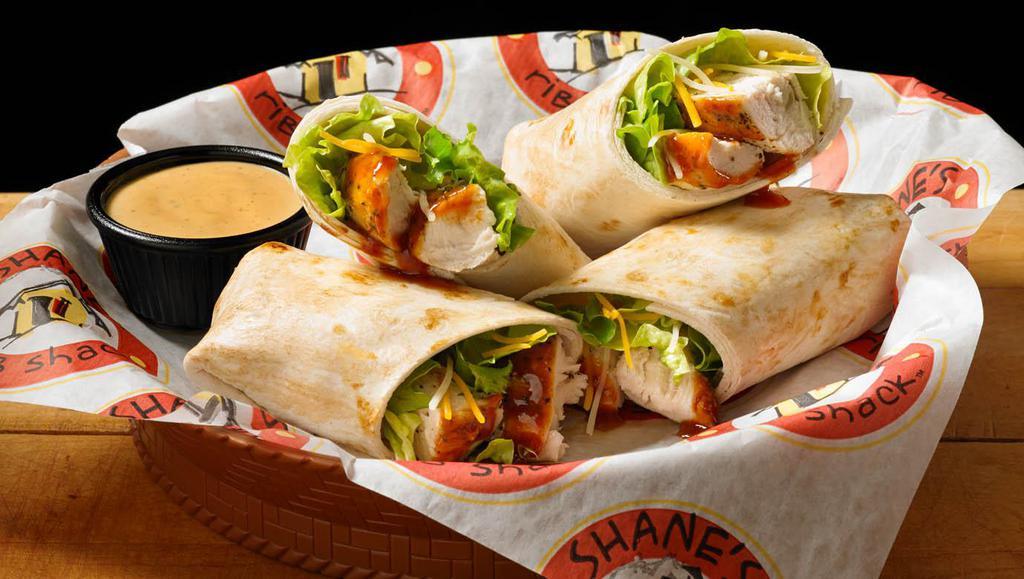 Shack Wraps · 2 tortilla wraps with your choice of meat, lettuce, pickles and shredded cheddar cheese.