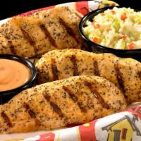 Chicken Tenders · Prepared fried or grilled and tossed in your favorite sauce. Served with fries. Ad toast for...