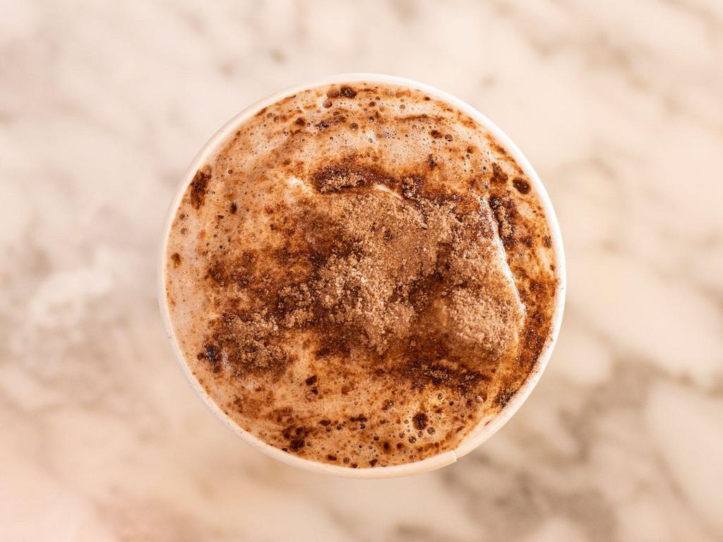 Cafe Mocha · Espresso shot with rich Swiss chocolate, steamed milk, and layer of foam.
