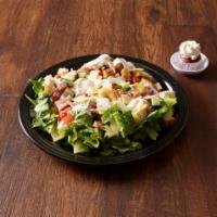 Chef Salad · Crisp romaine lettuce, Swiss cheese, sliced ham and turkey, Roma tomatoes, red onion, and cu...