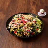 Southwest BBQ Chicken Salad · Crisp romaine lettuce, roasted BBQ chicken breast, Colby Jack cheese, Roma tomatoes, green o...