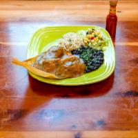 Tamales · 2 pork tamales, mean green chile. Served with black beans, cilantro lime rice. Lettuce and c...