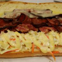 New Yorker Sandwich · Corned beef brisket and navel pastrami with cole slaw, Swiss cheese and dijonaisse.