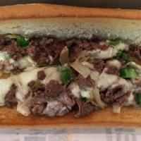 Philly Cheese Steak Sandwich · Sirloin steak grilled with green peppers, onions and white American cheese. Served on your c...