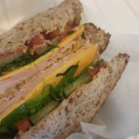 The Nana Sandwich · Turkey, cheddar, lettuce, tomato, pickle, and mustard.