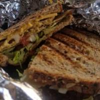 Vegan Nana Sandwich · Vegan Turkey, Vegan Cheddar, Tomato, Lettuce, Pickle, Mustard