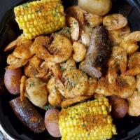 Shrimp Feast · Shrimp,corn on cob, potatoes and sausage all in one pot ready to eat