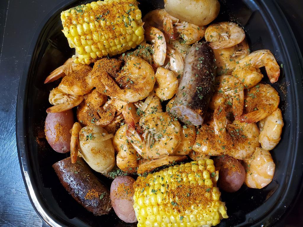 Shrimp Feast · Shrimp,corn on cob, potatoes and sausage all in one pot ready to eat