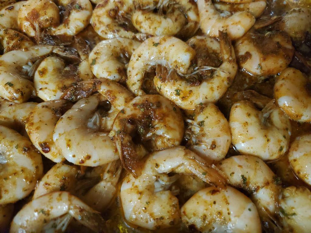 Baked Spicy Shrimp · Spicy shrimp over white rice.