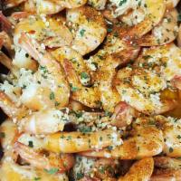 Baked Shrimp Basket · 30 large shrimp, onions and lemons, white rice