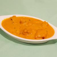 Chicken Tikka Masala · Boneless marinated chicken roasted and folded into a rich creamy sauce. Served with aromatic...