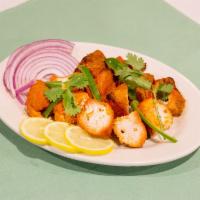 Chicken Tikka · Boneless chunks of chicken marinated in fresh spices and yogurt, roasted in a clay oven. Ser...