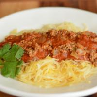 Ground Turkey Spaghetti Squash · Enjoy succulent ground turkey smothered in Italiano marinara sauce served on a bed of delect...