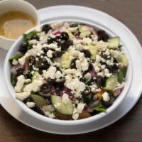 Greek Salad · Spring mix, tomato, red onion, cucumber, black olives, feta cheese and Italian dressing.