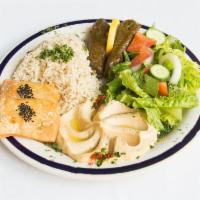 Vegetarian Plate · Hummus, grape leaves, cheese pie, salad and rice.