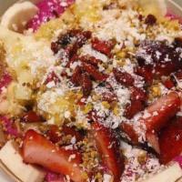 9.Pitaya Bowl · Almond or Oat Mylk, Banana, Mango, Dragonfruit, Raw Honey blended together, topped with chop...