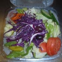 Garden Salad · Lettuce, tomatoes, onions, peppers, cabbage, carrots and cucumbers.