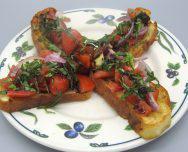 Bruschetta · Garlic bread topped with tomatoes, onions, basil, extra virgin olive oil and balsamic glaze.	