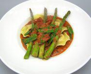 Lobster Ravioli · Lobster ravioli with fresh asparagus and peapods in a creamy tomato sauce.	