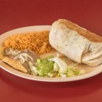 Burrito Dinner · Choice of meat: steak, chicken or ground beef 
Served with rice, and beans