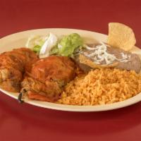 Chile Relleno Dinner · 2 poblano peppers stuffed with cheese. Served with rice, beans, lettuce, sour cream and guac...