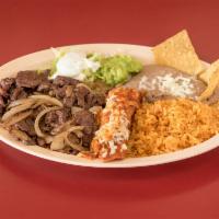 Carne a la Tampiquena · Tender skirt steak with 1 enchilada. Served with rice, beans, lettuce, sour cream, guacamole...