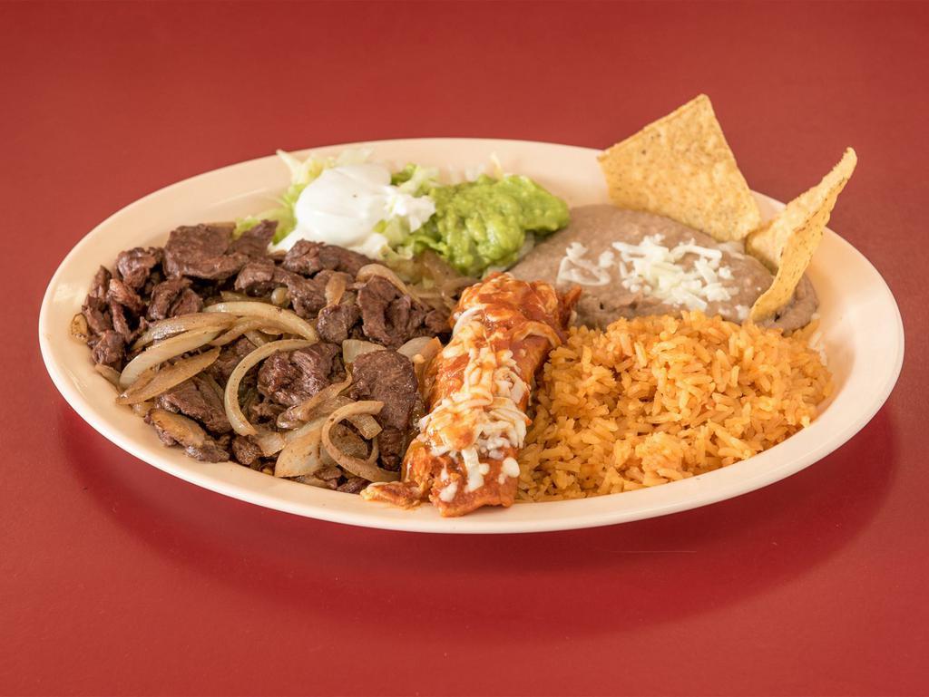 Carne a la Tampiquena · Tender skirt steak with 1 enchilada. Served with rice, beans, lettuce, sour cream, guacamole and tortillas.