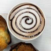 Hot Chocolate · Our Hot Chocolate is made of only a rich chocolate sauce and milk! Delicious Belgian chocola...