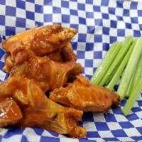 Wings · Traditional, jumbo, bone-in wings covered in your choice of sauce. 