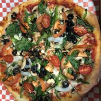 Veggie Pizza · Spinach, fresh tomatoes, green peppers, olives, onions, mushrooms, and arugula.