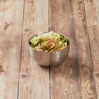 Perfect Guacamole · Just like Mom’s! Made with red onion, cilantro, tomato, garlic, fresh lime juice and, salt.