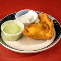 Samosa · Served with mint green sauce.