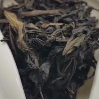 Qi Lan Rock Oolong · A light roasting gives this oolong a natural almond taste and aroma. Thick and sweet with a ...