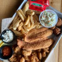 Fried Fish Fillet Dinner · Fries, Coleslaw, and Hushpuppies