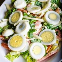 Ghanaian Salad · Lettuce, tomatoes, cucumbers, carrots, onions, boiled egg, tuna and creamy dressing.