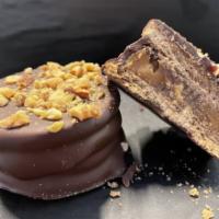 Nutnutel Alfajor · Filled with milk caramel and heart of nuts and chocolate cream with hazelnuts, covered with ...