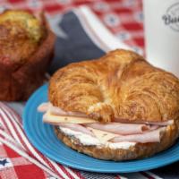 Ham and Cheese Croissant · Butter croissant (french) filled with smoked ham, swiss cheese, and cream cheese.