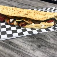 Green House Flatbread · Hummus, grilled mushrooms, grilled zucchini, grilled peppers, sun dried tomatoes and feta ch...