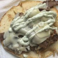 Philly Pita · Choice of gyro or chicken stuffed with sauteed mushrooms, onions, mozzarella cheese, fries a...