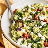 Quinoa Salad · Quinoa, avocado, cilantro, tomatoes, red onions, cucumbers and feta cheese over crispy mixed...