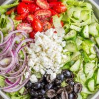 Greek Salad · Crispy mixed greens, tomatoes, onions, cucumbers, feta cheese and Kalamata olives.