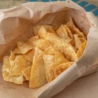 Bag of Chips · Small lunch bag illed with corn tortilla chips fried in corn oil on site every day.