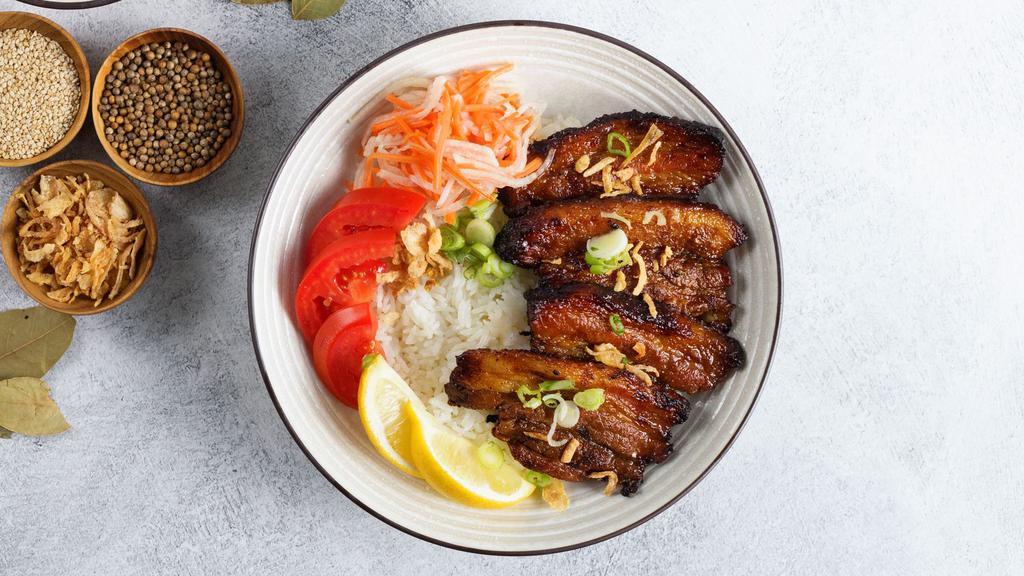 Pork Belly Combo · Fresh Pork Belly marinated in our secret Asian flavored marinade and spices, grilled to perfection and served with your choices of white rice, garlic rice and/or pancit noodles. 