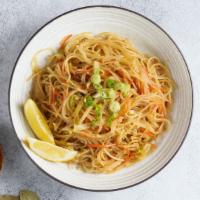 Pancit Noodles · Filipino style stir fry thin noodles with cabbage, carrots, celery and onions.