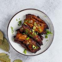 Pork Belly - A la carte · Fresh Pork Belly marinated in our secret Asian flavored marinade and spices, grilled to perf...