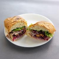 2. Turkey Cranberry Sandwich · Turkey, cream cheese, lettuce, cranberry and walnuts.